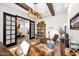 Stylish office featuring hardwood floors, a chaise lounge, and modern decor throughout at 6320 E Gloria Ln, Cave Creek, AZ 85331