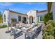 Outdoor living area with a fire pit, desert plants, and comfortable seating at 6320 E Gloria Ln, Cave Creek, AZ 85331