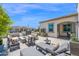 Outdoor patio with a fire pit, lounge chairs, and views of the community at 6320 E Gloria Ln, Cave Creek, AZ 85331
