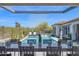 Stunning pool area with a waterfall feature and comfortable seating areas, perfect for relaxation at 6320 E Gloria Ln, Cave Creek, AZ 85331
