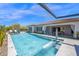 Backyard pool with built-in water feature and desert landscape views at 6320 E Gloria Ln, Cave Creek, AZ 85331