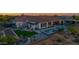 Beautiful backyard features a pool, spa, patio, and outdoor living space with mountain views at 6320 E Gloria Ln, Cave Creek, AZ 85331