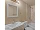 Well-lit bathroom featuring a bathtub, updated marble-look shower surround, and vanity at 6447 W Piccadilly Rd, Phoenix, AZ 85033