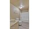 Bright bathroom features a shower-tub combination and wood look vinyl flooring at 6447 W Piccadilly Rd, Phoenix, AZ 85033
