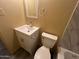 This bathroom features a new vanity, mirror, updated lighting and fixtures, plus a modern sink and toilet at 6447 W Piccadilly Rd, Phoenix, AZ 85033