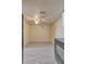 This cozy room has vinyl flooring, a ceiling fan and neutral paint at 6447 W Piccadilly Rd, Phoenix, AZ 85033