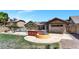 Backyard featuring pool, patio, grill and landscaping at 6457 E Encanto St, Mesa, AZ 85205
