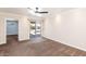 Comfortable carpeted bedroom features access to the backyard pool area through sliding glass doors at 6457 E Encanto St, Mesa, AZ 85205