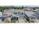 Aerial view of a modern home in a neighborhood with palm trees and mountain views at 6743 N 9Th Dr, Phoenix, AZ 85013
