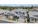 Aerial shot showcases a modern home nestled in a lush neighborhood with scenic mountain backdrop at 6743 N 9Th Dr, Phoenix, AZ 85013