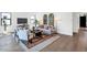 Inviting living room with hardwood floors, stylish furniture, and ample natural light at 6743 N 9Th Dr, Phoenix, AZ 85013