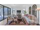 Bright living room features modern furniture, stylish decor, and ample natural light at 6743 N 9Th Dr, Phoenix, AZ 85013