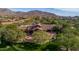 Expansive estate with mature landscaping, tile roof and mountain views in upscale community at 6931 E Teton Cir, Mesa, AZ 85207