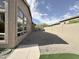 Spacious backyard featuring desert landscaping, a privacy wall, and views of the neighborhood at 6931 E Teton Cir, Mesa, AZ 85207
