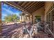 Outdoor covered exercise facility overlooking desert landscape, with cycling machines at 6931 E Teton Cir, Mesa, AZ 85207