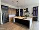 Spacious kitchen features a large island, modern cabinetry, and stainless steel appliances at 6931 E Teton Cir, Mesa, AZ 85207
