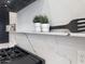 Kitchen details including quartz shelving with small decor items adding a personalized touch at 6931 E Teton Cir, Mesa, AZ 85207