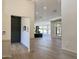 Open-concept living space showcasing wood floors, neutral walls, and modern fixtures at 6931 E Teton Cir, Mesa, AZ 85207