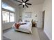Bright bedroom with large windows, carpet, and ample natural light at 6931 E Teton Cir, Mesa, AZ 85207