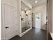 Luxurious marble shower with dual shower heads and sleek black fixtures at 6931 E Teton Cir, Mesa, AZ 85207