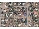 Aerial view of the neighborhood, showing the property outlined in red with nearby houses, landscaping, and street layout at 6936 E Wethersfield Rd, Scottsdale, AZ 85254