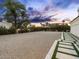 Large driveway with decorative pavers, manicured greenery and beautiful landscaping at 7129 E Caron Dr, Paradise Valley, AZ 85253