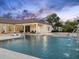 Resort-style pool with water feature, perfect for enjoying the backyard and entertaining guests at 7129 E Caron Dr, Paradise Valley, AZ 85253