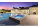 Inviting pool and spa featuring modern design, and an expansive patio perfect for entertaining at 7129 E Caron Dr, Paradise Valley, AZ 85253
