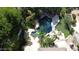 Aerial view of the pool, patio, putting green, and backyard showing landscaping and layout at 7475 E Gainey Ranch Rd # 4, Scottsdale, AZ 85258