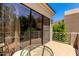 Balcony with wrought iron railing overlooks verdant greenery, offering a relaxing outdoor space at 7475 E Gainey Ranch Rd # 4, Scottsdale, AZ 85258