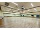 Large dance studio with wood floors, large mirrors, ceiling fans, and plenty of space for classes or individual workouts at 7475 E Gainey Ranch Rd # 4, Scottsdale, AZ 85258