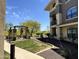Outdoor grilling area featuring pergola, BBQ, and green space for community residents at 7601 E Indian Bend Rd # 1049, Scottsdale, AZ 85250