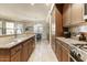 Well-equipped kitchen with stainless steel appliances, granite countertops, and plenty of cabinet space at 7601 E Indian Bend Rd # 1049, Scottsdale, AZ 85250