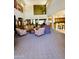 Elegant lobby with a lounge area, stylish furniture, and access to the kitchen area at 7601 E Indian Bend Rd # 1049, Scottsdale, AZ 85250