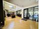 Well-lit lobby featuring a chandelier, seating, front desk, and access to the on-site fitness center at 7601 E Indian Bend Rd # 1049, Scottsdale, AZ 85250