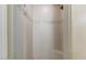 Walk-in shower featuring neutral tile, decorative accents, and a built-in bench at 7601 E Indian Bend Rd # 1049, Scottsdale, AZ 85250