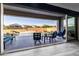 Relaxing outdoor space with a beautiful pool, stylish patio furniture, and serene backyard views at 8138 E Jacaranda St, Mesa, AZ 85207