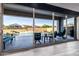Stunning backyard oasis featuring a sparkling pool, comfortable lounge furniture, and lush landscaping at 8138 E Jacaranda St, Mesa, AZ 85207
