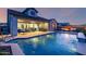 Beautiful backyard featuring a refreshing pool and a covered patio with outdoor dining furniture at 8138 E Jacaranda St, Mesa, AZ 85207