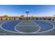 Community basketball court features painted surface and metal fencing at 8138 E Jacaranda St, Mesa, AZ 85207