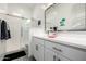 Modern bathroom showcasing a glass shower, white vanity, and stylish decor at 8138 E Jacaranda St, Mesa, AZ 85207