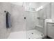 Sleek bathroom with white marble shower, glass door, and a built-in seat at 8138 E Jacaranda St, Mesa, AZ 85207