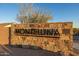Welcome to Monteluna, shown in this community sign with stone backdrop at 8138 E Jacaranda St, Mesa, AZ 85207