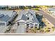 Aerial view of a home with desert landscaping, paver driveway and gray roof at 8138 E Jacaranda St, Mesa, AZ 85207