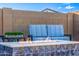 Inviting outdoor space with modern fire pit and comfortable seating, perfect for entertaining at 8138 E Jacaranda St, Mesa, AZ 85207