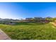 Community green space features playground, picnic pavilion and lush grass at 8138 E Jacaranda St, Mesa, AZ 85207