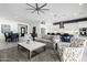 Spacious open-concept layout with a cozy living area, dining space, and a view of the modern kitchen at 8138 E Jacaranda St, Mesa, AZ 85207