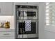 Stainless steel KitchenAid double oven with white cabinets and granite countertops in a modern kitchen at 8138 E Jacaranda St, Mesa, AZ 85207