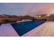 Stunning backyard features a spacious pool with fountains, mature landscaping, and privacy fencing at 8138 E Jacaranda St, Mesa, AZ 85207