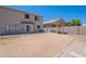 Expansive backyard with potential for landscaping and outdoor activities under a clear sky at 9352 W Pioneer St, Tolleson, AZ 85353